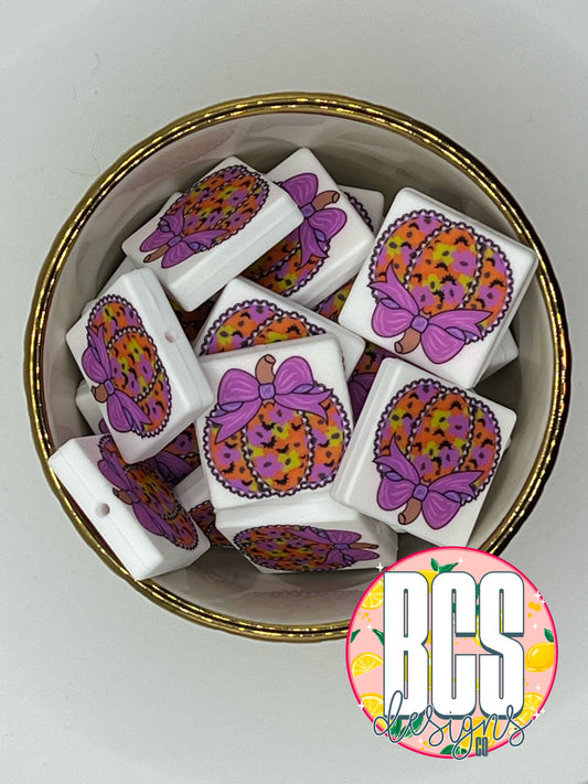 Pumpkin W/ Purple Bow Focal Bead